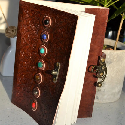 Handcrafted 7 Chakra leather journal with stones & recycled paper. Perfect for mindfulness, meditation, stress relief & as a meaningful eco-friendly gift.