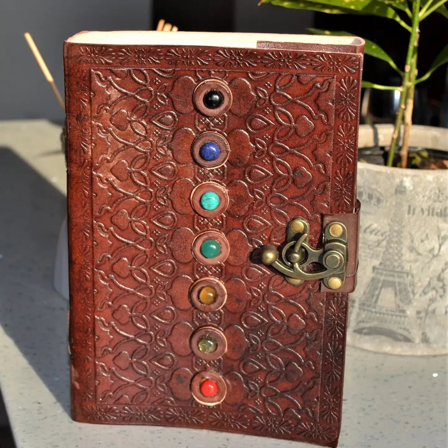 Handcrafted 7 Chakra leather journal with stones & recycled paper. Perfect for mindfulness, meditation, stress relief & as a meaningful eco-friendly gift.